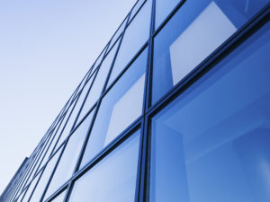 Architecture detail Modern Glass facade Background Blue tone